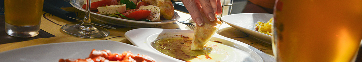 Eating Greek Mediterranean at Happy Gyro restaurant in Washington, DC.